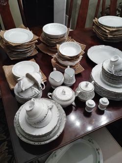 Porcelain dinner set with silver