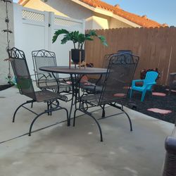 Iron Table With 4 Chairs that Rock