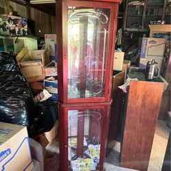 Corner style wood and glass curio cabinet