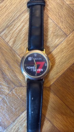 Vintage watch with black leather strap