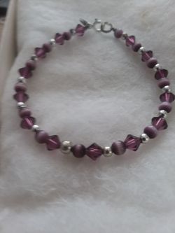 Beaded bracelet purple tones