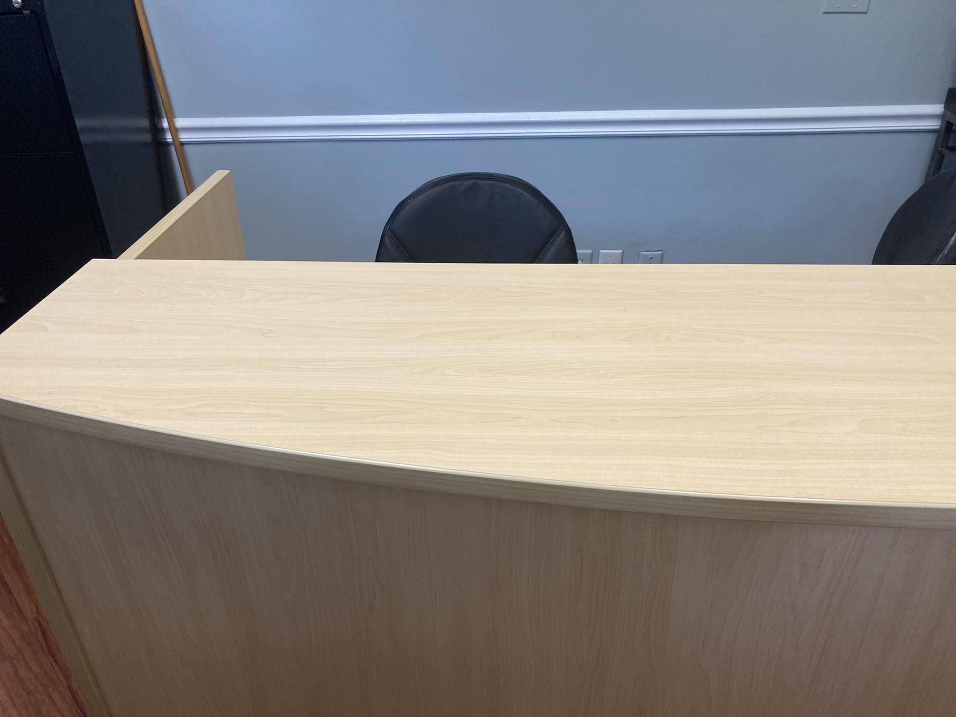 Big reception desk 30in deep 40 inch high and 71” long with curved front.