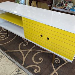 Mid-Century modern credenza/ TV stand banana, yellow and white measures 63 in Long 25 and 1/2 in high 15 in deep