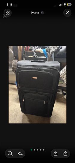 LOW PRICE MOVING- LARGE BLACK LUGGAGE