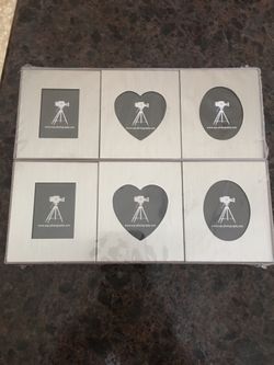 Set of Two Picture Frames. Each Pack has 3 Frames