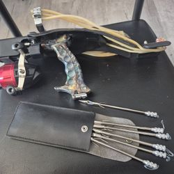 Laser Sight Slingshot/Wrist Rocket With Fishing Reel And Spears