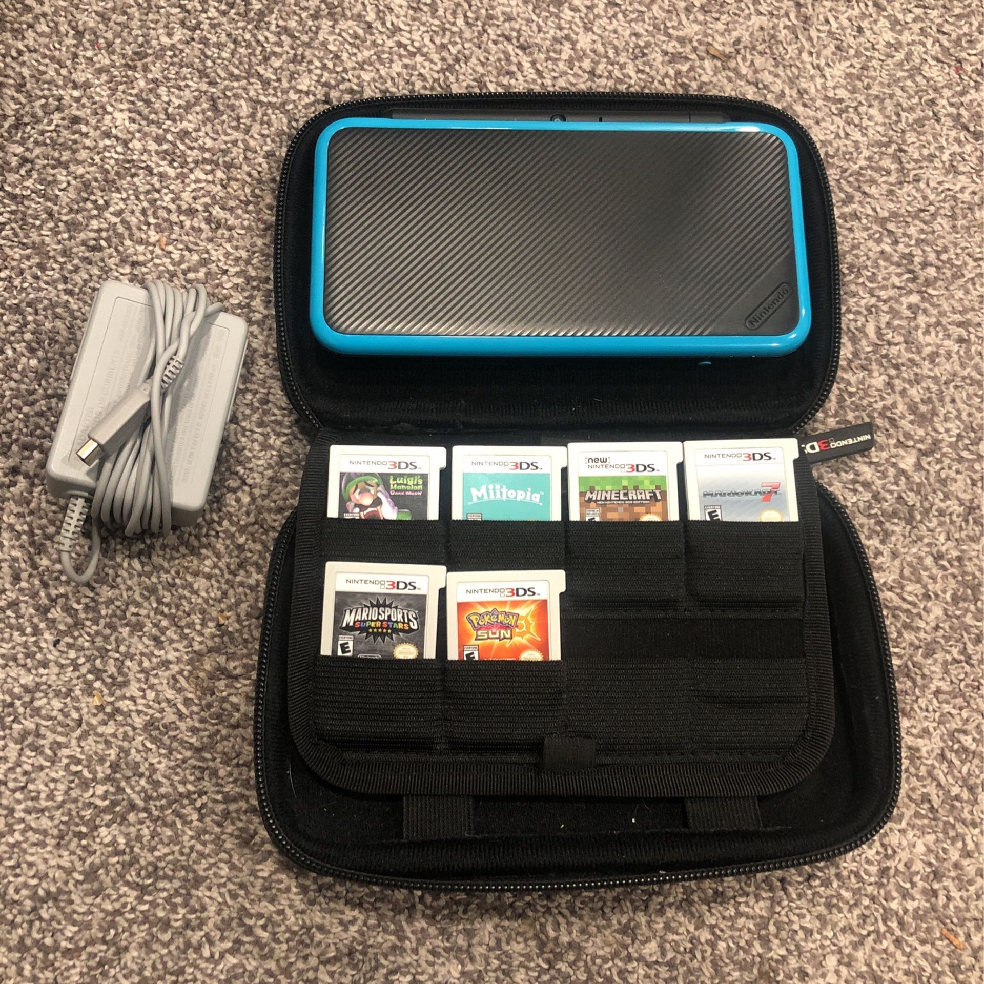 “New” 2DS XL with games