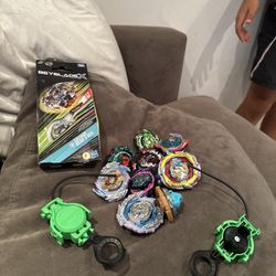 Beyblade Burst Lot – 9 Metal Beyblades with Launchers & Parts