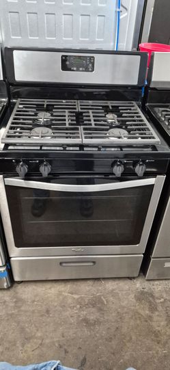 Whrilpool gas stove 4 burners stainless steel