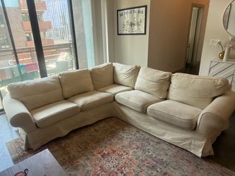White Slipcovered Sectional Couch
