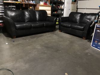 Black leather couch and loveseat set