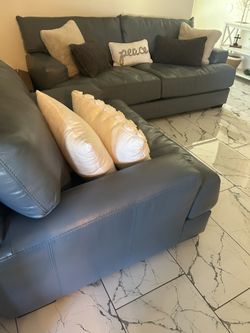 2 dark gray leather Couch