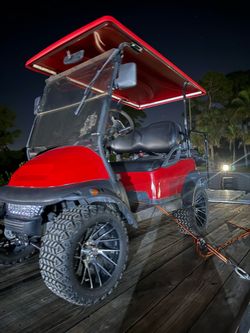 Red Lifted Golf Cart with Off-Road Tires club car TITLE IN HAND