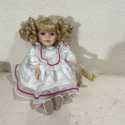 Head Moves With Music Collectible Doll