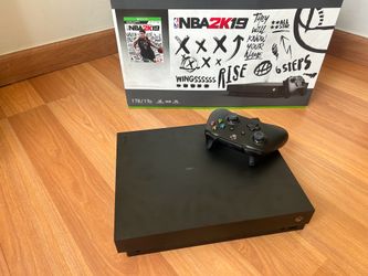 xbox one x complete. WONT BOOT UP needs reset