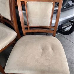 set of four dining chairs or barstools