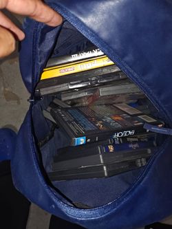 Bag pack full of dvds movies