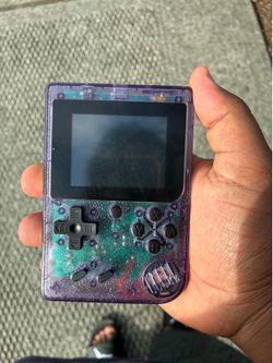 Merkury MI-PGC01 Purple Clear Handheld System with Headphone Jack