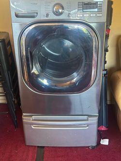 LG Gas Dryer with pedestal drawer stand.