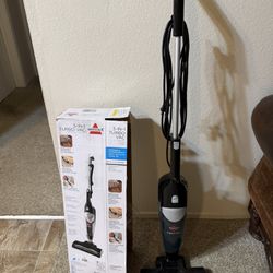 Bissell vacuum cleaner with box, works perfectly.