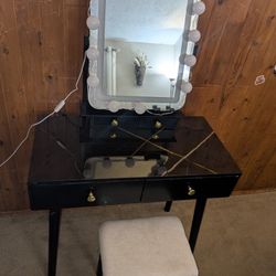 Vanity With Lighted Mirror And Drawers