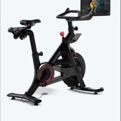 Peloton Exercise Bike with mat shoes and weights $1977 retail value