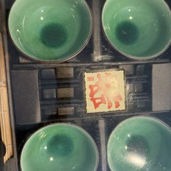 Asian bowl set with chopsticks, holders and placemats 