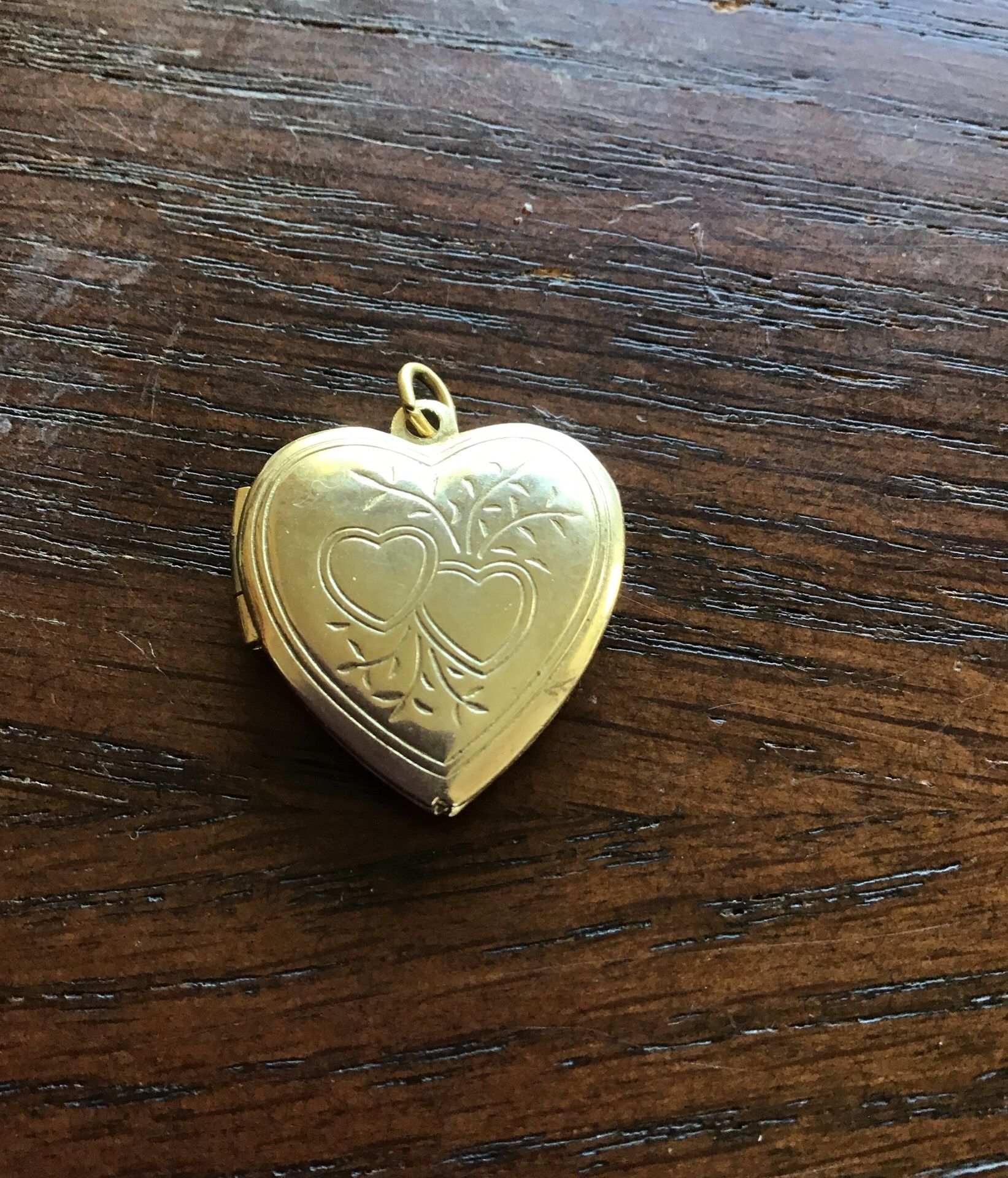 Gold tone Heart Locket.