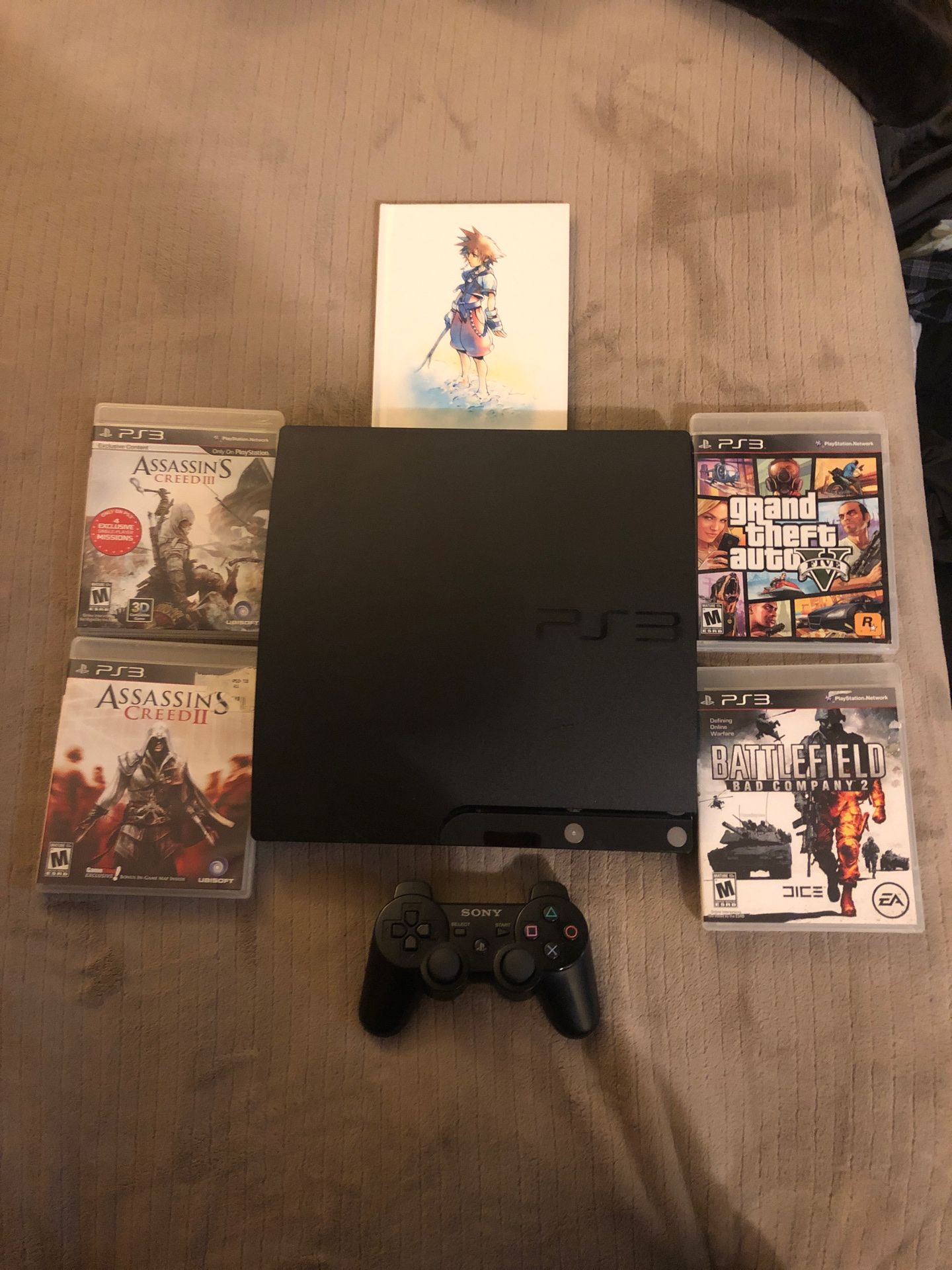 PS3 Slim with 5 games