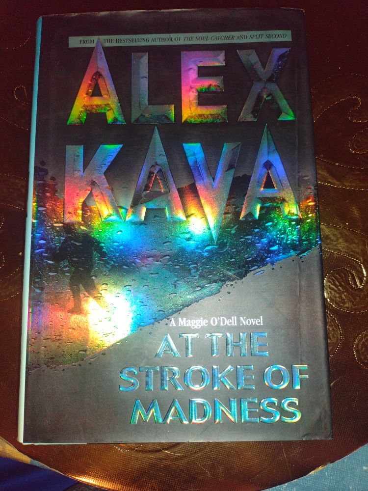 2003  BOOK AT THE STROKE OF MADNESS BY ALEX KAVA