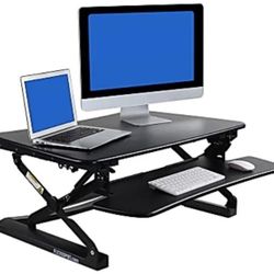 FlexiSpot M2 Height-Adjustable Standing Desk Riser With Removable Keyboard Tray.