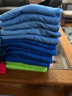 32 child’s t-shirts, size M and 10-12