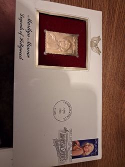 Commemorative Gold US Postal Stamps.