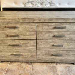 Rustic Wood 8-Drawer Dresser And Framed Wall Mirror