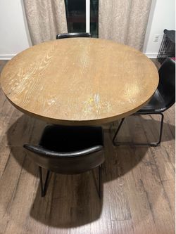 Free table with 4 black chairs