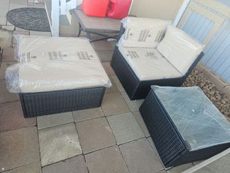 Will take best offers not free new patio wicker chair and foot Ottoman coffee table with galss top brand new in the box