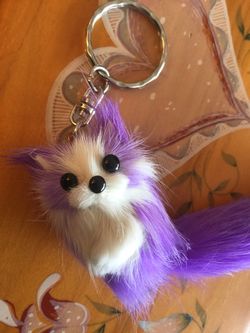Purple Foxy keychain 🔑🦊 Soft fur ball with feather & gemstones keychain $12 / Leather wallet keychain $20😁👍🔑