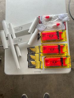 Planer boards, clips, minnow nets, rod holders