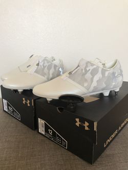 Under armour soccer futbol metal stud cleats with remover. I have a size 10.5 and also a size 12 left. Selling for 150.00 each! Retail is 230.00 plus