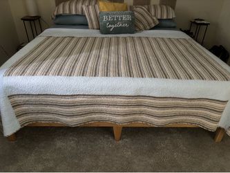 Moving Sake- Selling a like-new king-size mattress and solid wood platform bed frame as a set for $125