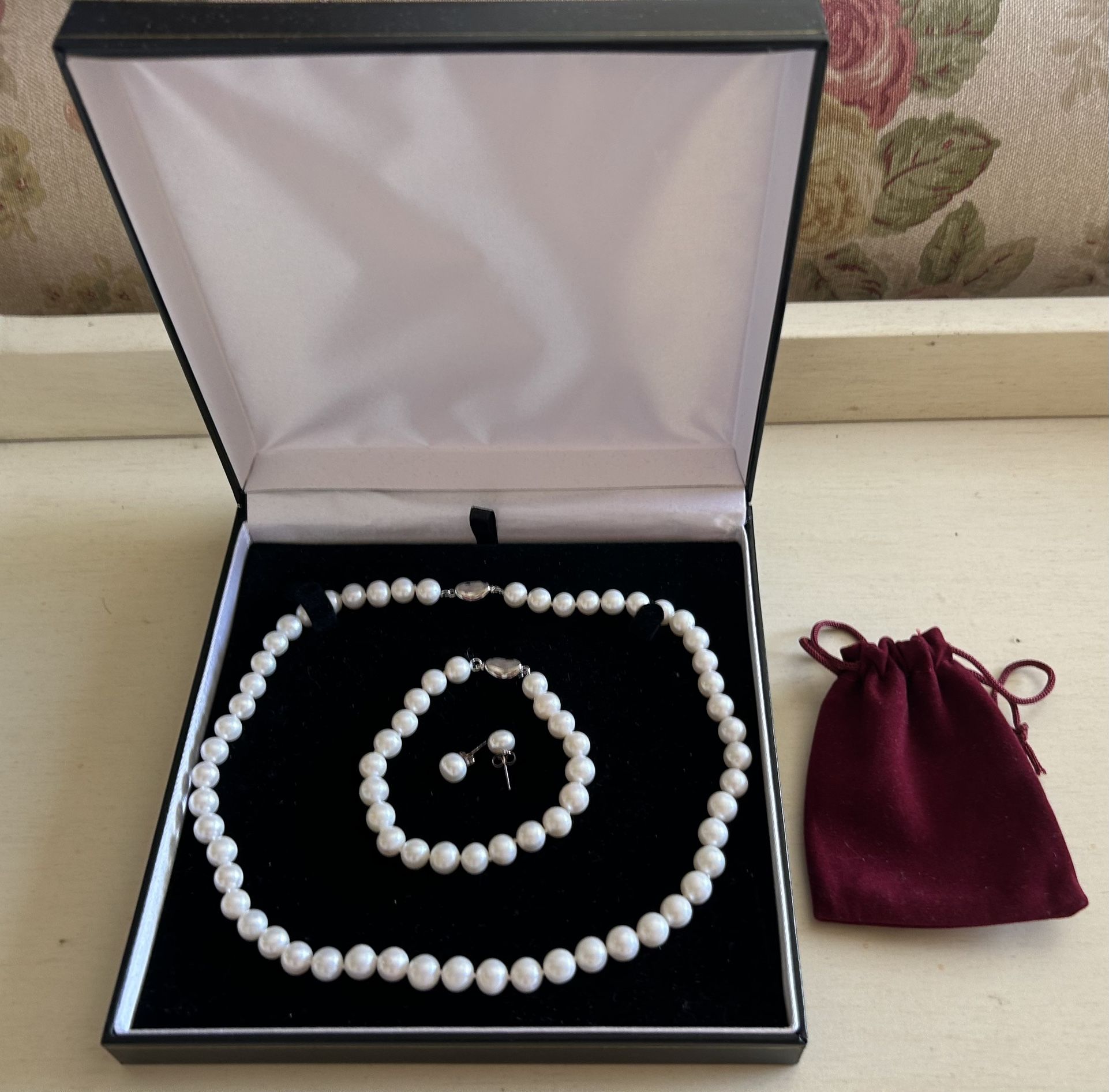 Pearl necklace set with bracelet and earrings. Cash only, please