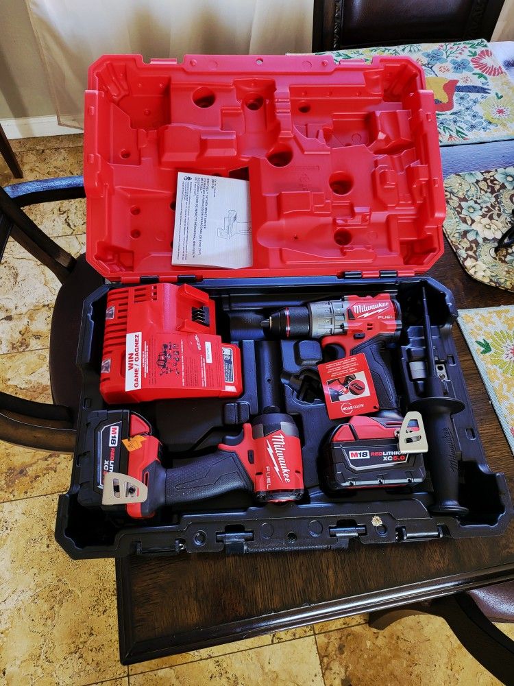 Milwaukee M18 FUEL 18V Lithium-Ion Brushless Cordless Hammer Drill and Impact Driver Combo Kit (2-Tool) with 2 Batteries
((Firm on price No lowballers