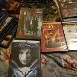 Big Lot Of DVDs And Player 