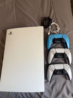 PS5 with 3 controllers