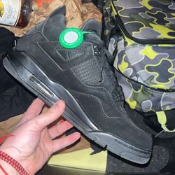 Black Cat Jordan 4s