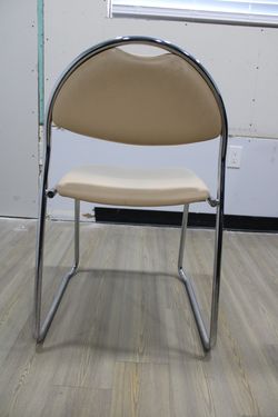 Beige Vinyl Stackable Chairs (8ct)
