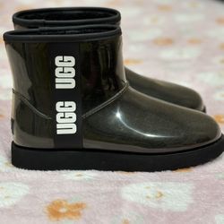 UGG Classic Clear Mini waterproof boots in black with a high-shine finish and faux-shearling lining