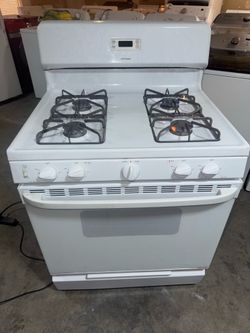 Gas Stove by Ge everything working3 Month Warranty we deliver