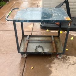 Rolling metal tool cart comes with extra casters