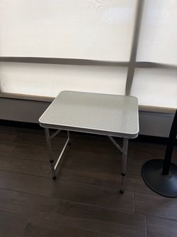 Small adjustable table